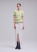 A model wears the ISSEY MIYAKE RILL rill-shirt-dark-navy-1.