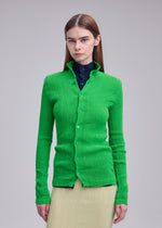 A model wears the ISSEY MIYAKE RILL rill-shirt-green-2.