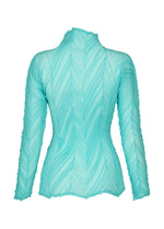 A detail shot of the ISSEY MIYAKE ZIGZAG PLEATS top.