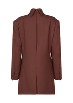 A detail shot of the ISSEY MIYAKE UNTITLED tunic.