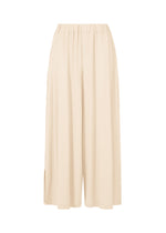 A product shot of the ISSEY MIYAKE DRAPE JERSEY-68 trousers in off-white.