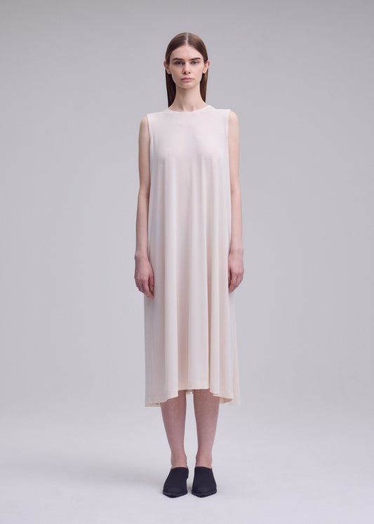 A model wears the ISSEY MIYAKE DRAPE JERSEY-68 dress.