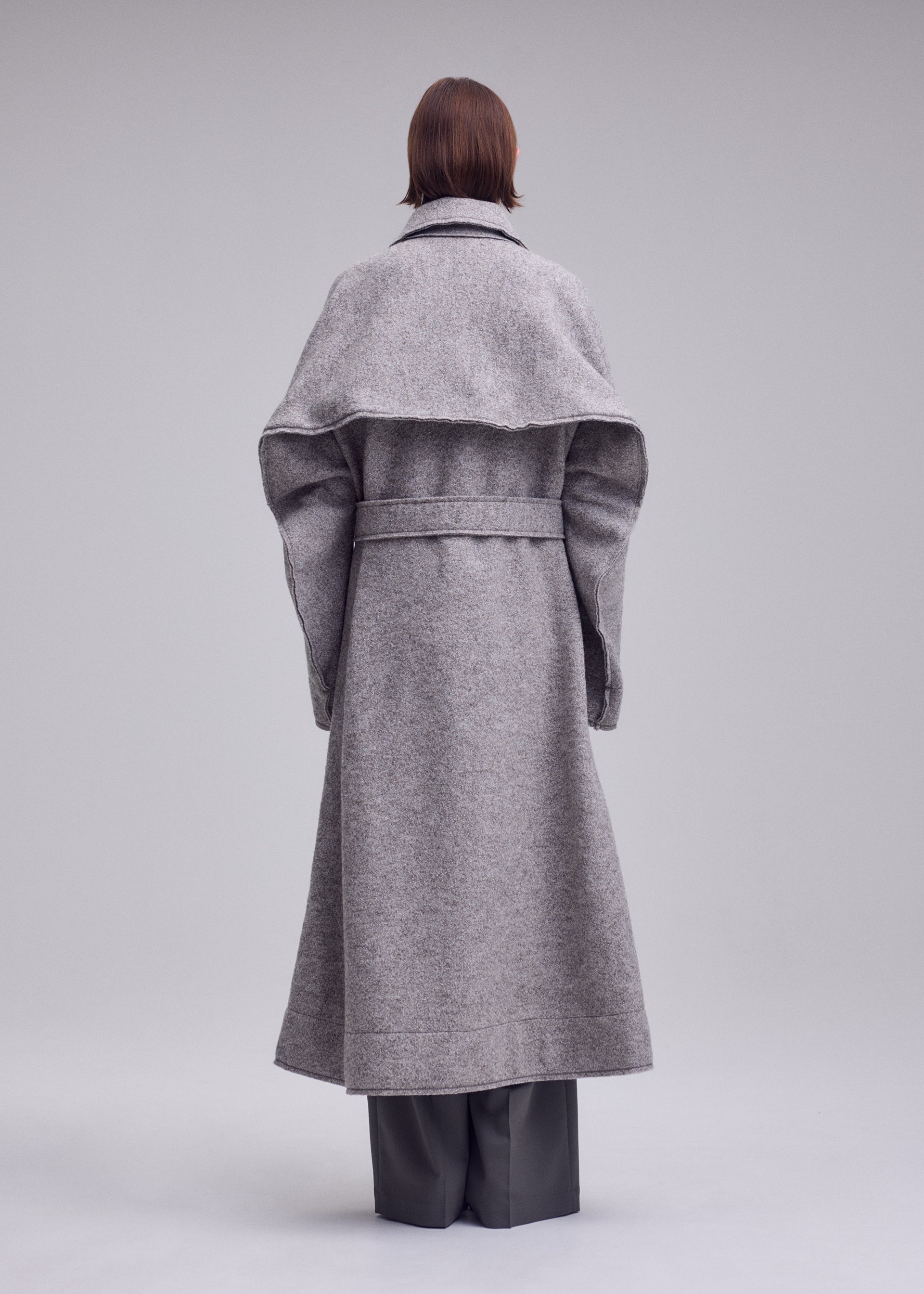 WOOLEN GRANITE Mid-length Coat Beige – The official ISSEY MIYAKE