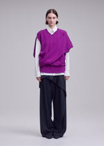 A model wears the ISSEY MIYAKE O KNIT o-knit-vest-purple.