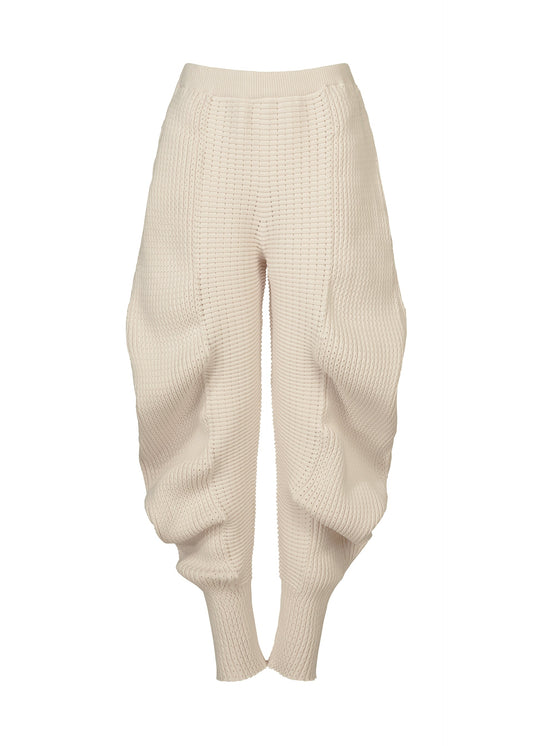 A product shot of the ISSEY MIYAKE FOUND STONE trousers in off-white.