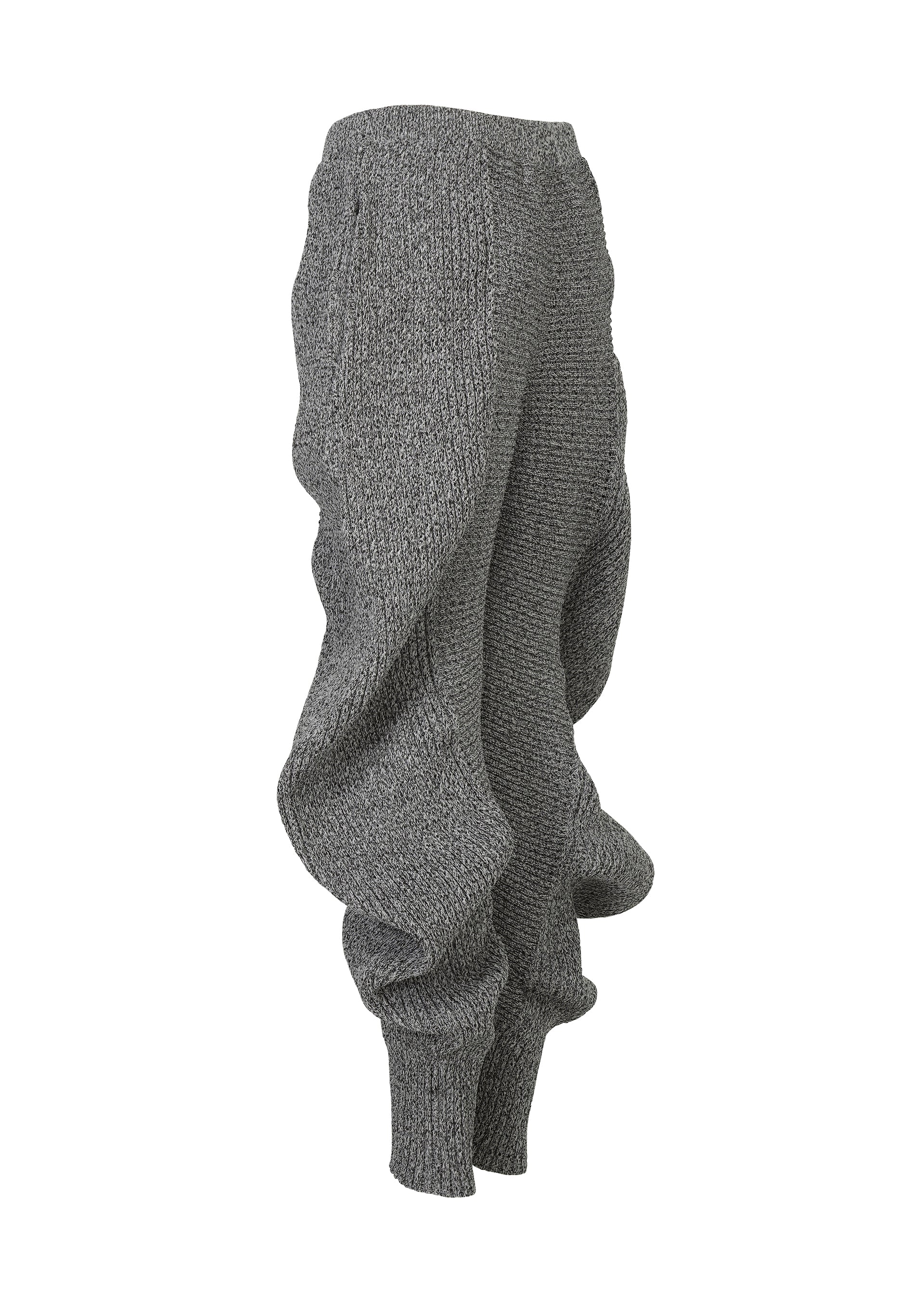 A detail shot of the ISSEY MIYAKE FOUND STONE trousers.