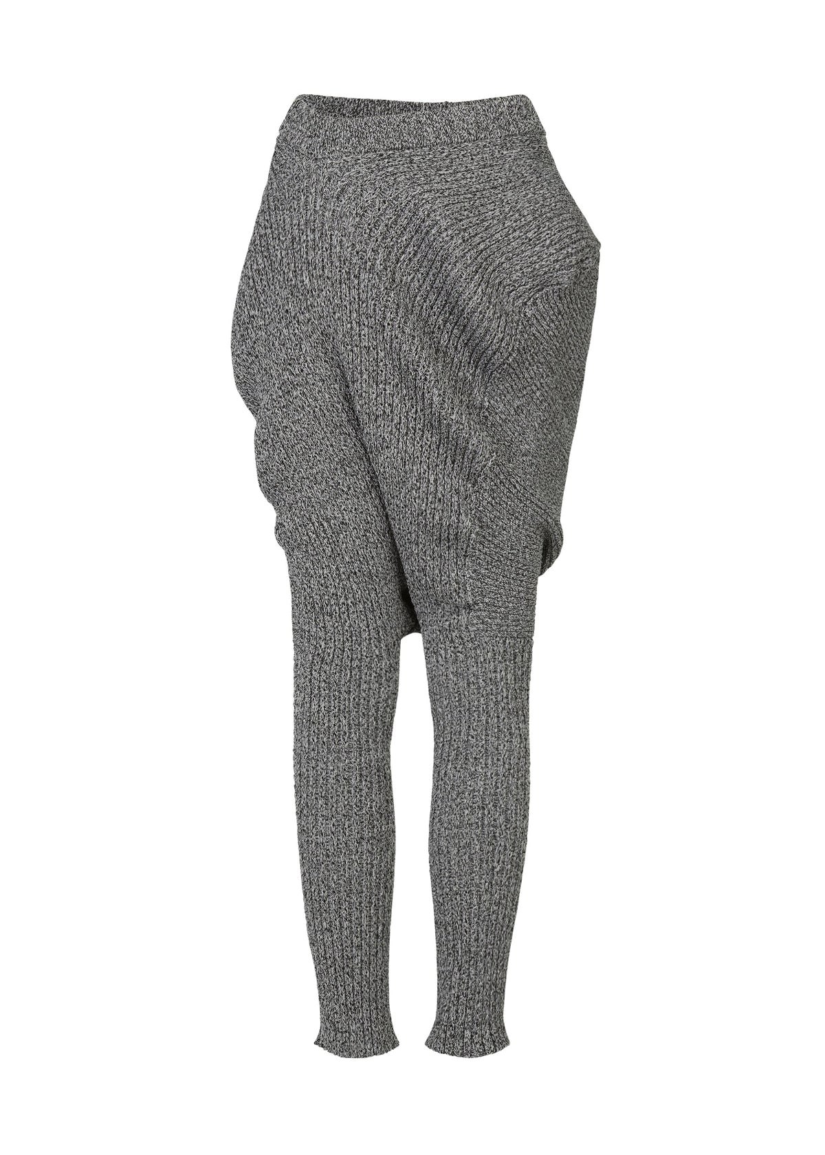 A detail shot of the ISSEY MIYAKE FOUND STONE trousers.