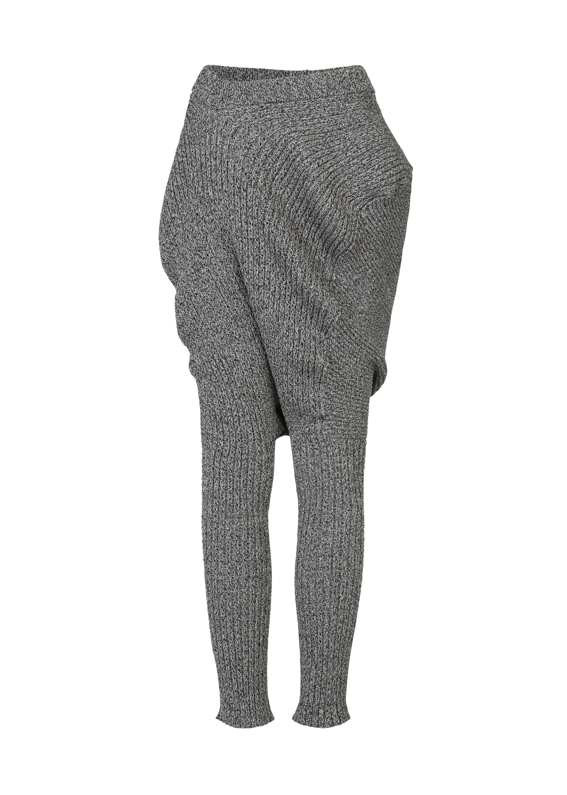 A detail shot of the ISSEY MIYAKE FOUND STONE trousers.