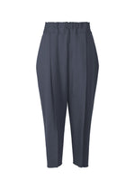A product shot of the ISSEY MIYAKE CAMPAGNE trousers in dark navy.