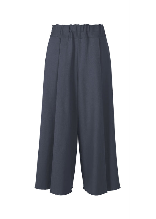 A product shot of the ISSEY MIYAKE CAMPAGNE trousers in dark navy.
