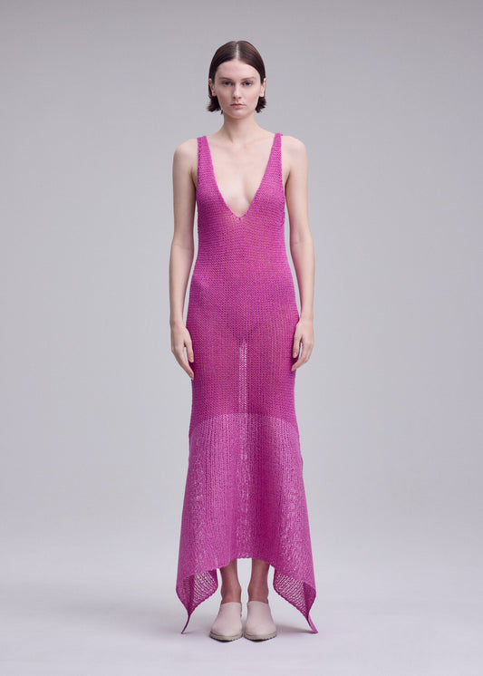 A model wears the ISSEY MIYAKE PANINI PULLED panini-pulled-dress-black.