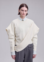 A model wears the ISSEY MIYAKE O KNIT o-knit-top-purple.