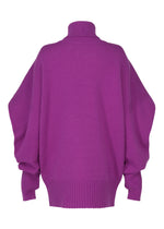 A detail shot of the ISSEY MIYAKE O KNIT top.