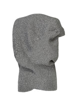 A detail shot of the ISSEY MIYAKE FOUND STONE top.