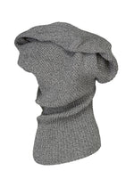 A detail shot of the ISSEY MIYAKE FOUND STONE top.