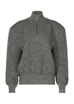 A product shot of the ISSEY MIYAKE HANDSOME KNIT top in gray.