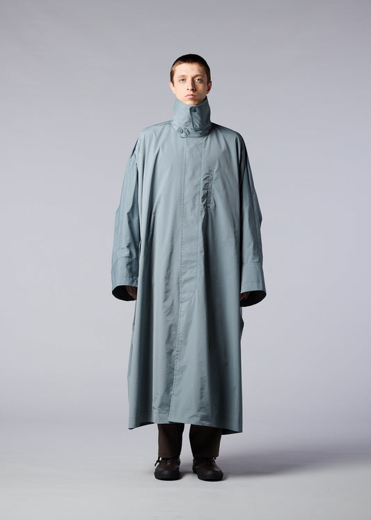 A model wears the IM MEN WIND COAT coat.