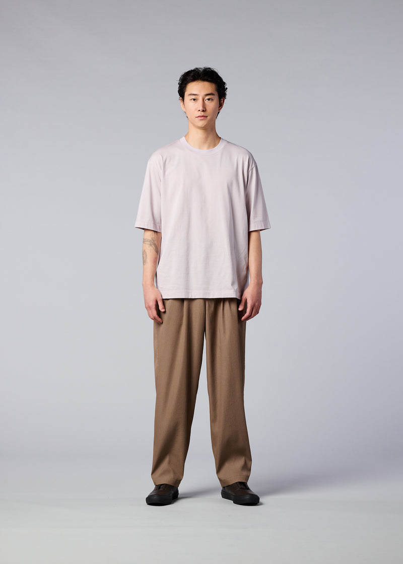 A model wears the IM MEN  AIR trousers