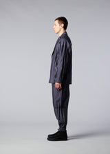 A model wears the IM MEN  DUO trousers