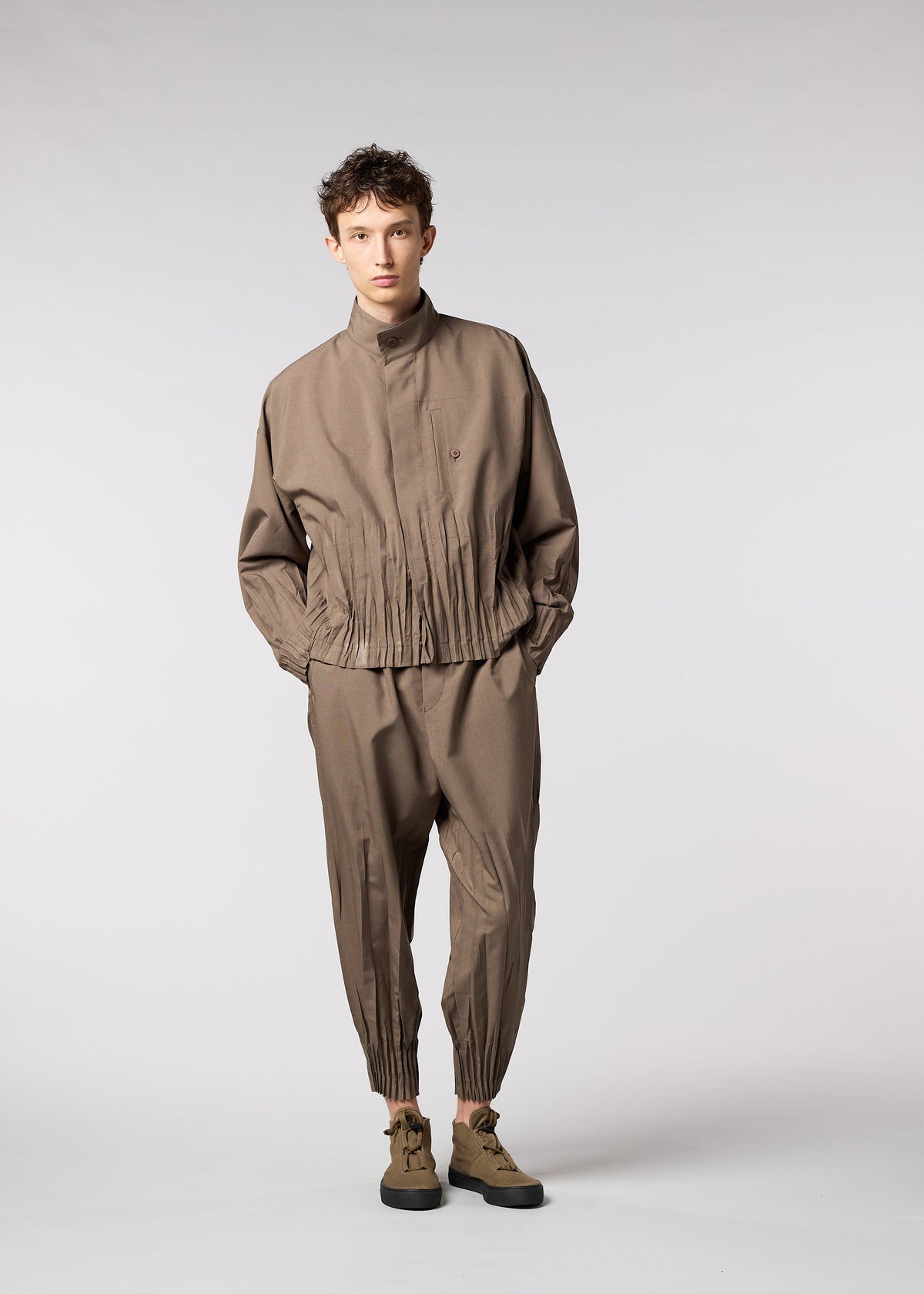 A model wears the IM MEN WAFT jacket.