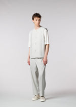 A model wears the IM MEN AIR PLEATS vest.