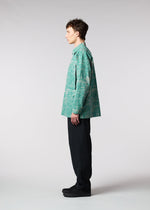 A model wears the IM MEN LUCID trousers.