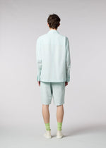 A model wears the IM MEN LUCID trousers.