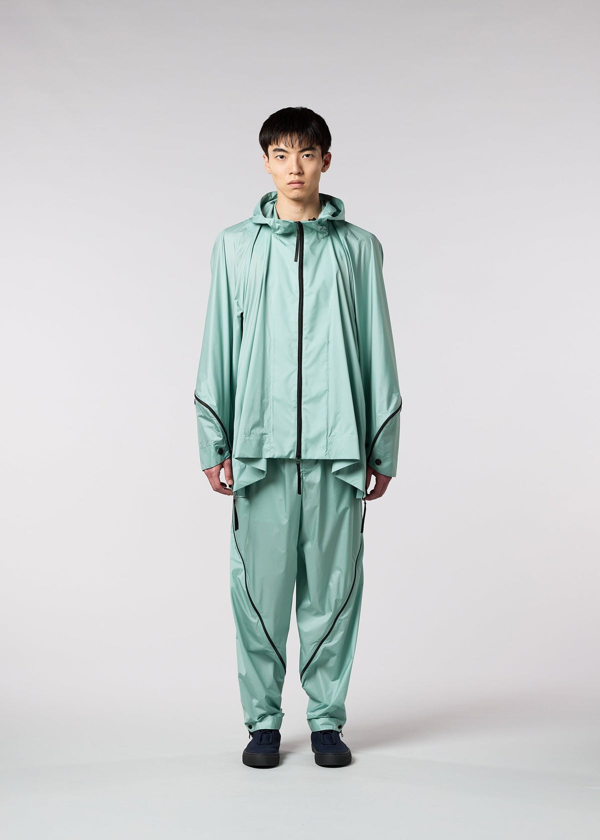 A model wears the IM MEN WIND trousers.