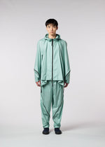 A model wears the IM MEN WIND trousers.