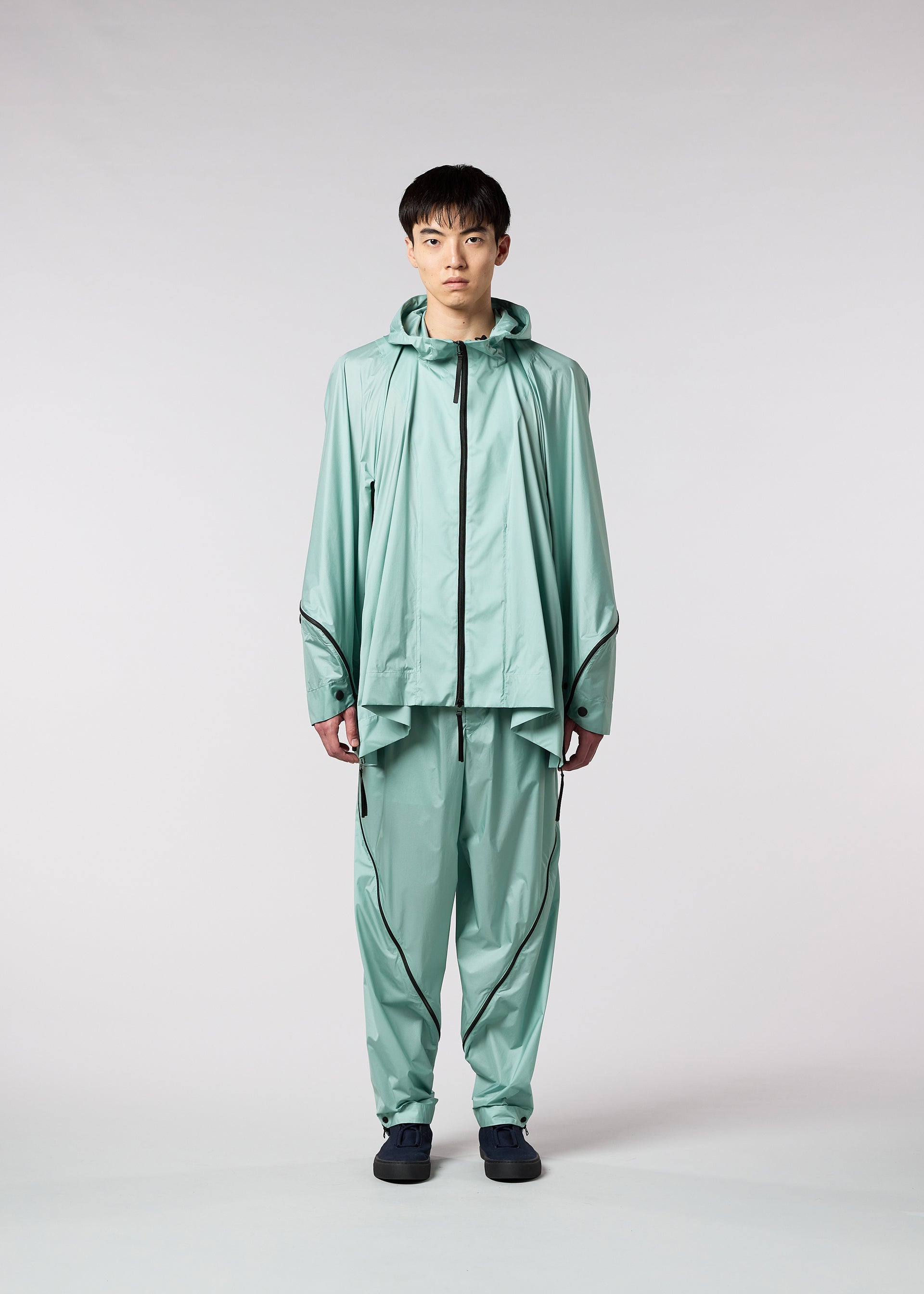 A model wears the IM MEN WIND trousers.