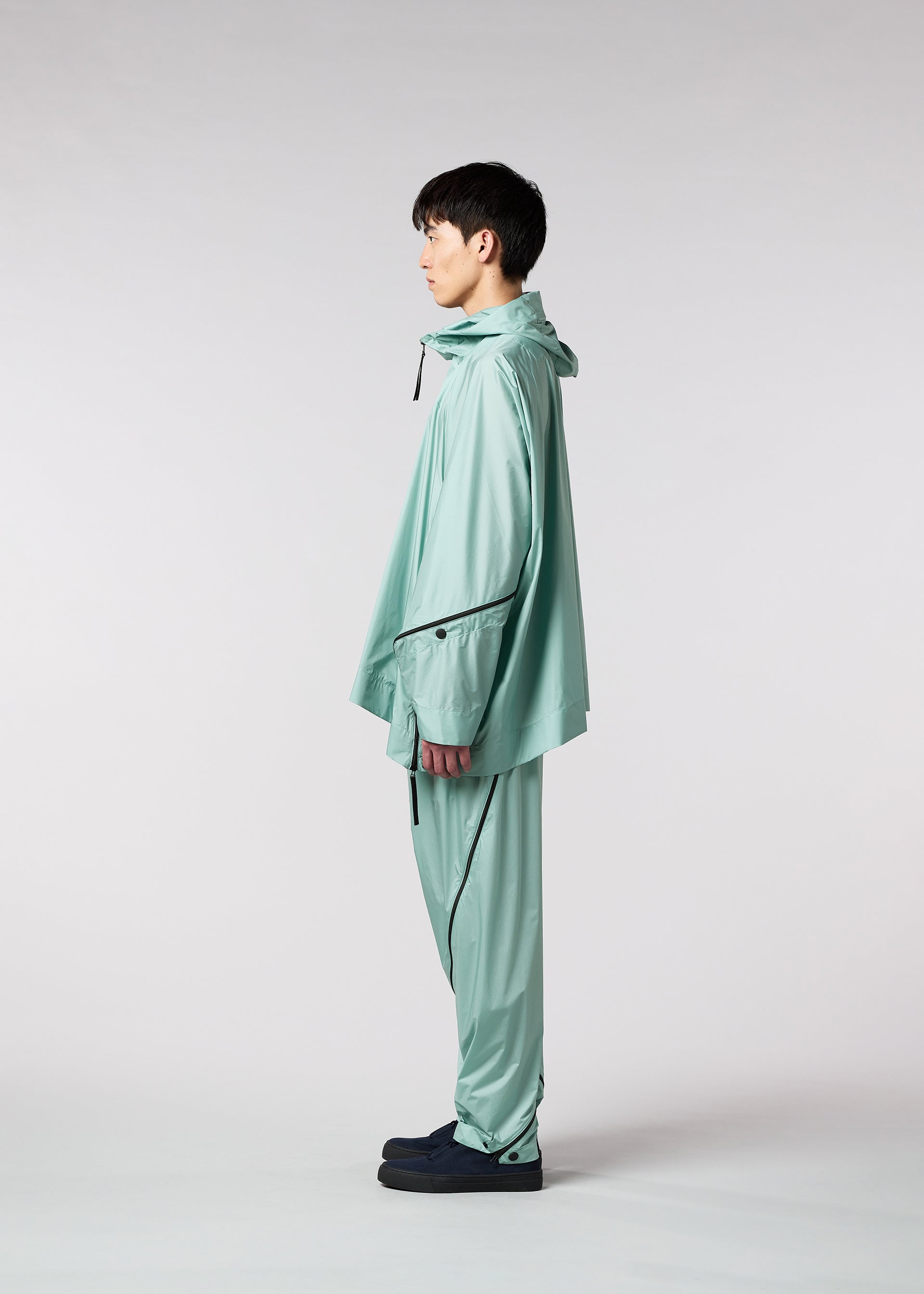 A model wears the IM MEN WIND trousers.