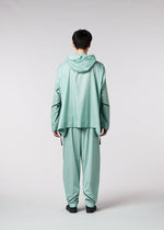 A model wears the IM MEN WIND trousers.