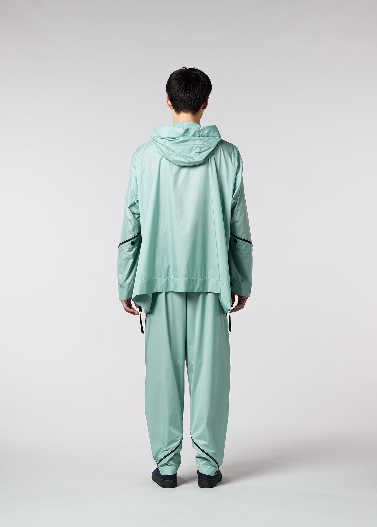 A model wears the IM MEN WIND trousers.
