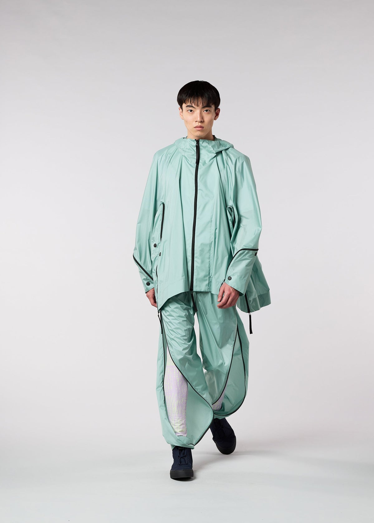 A model wears the IM MEN WIND trousers.