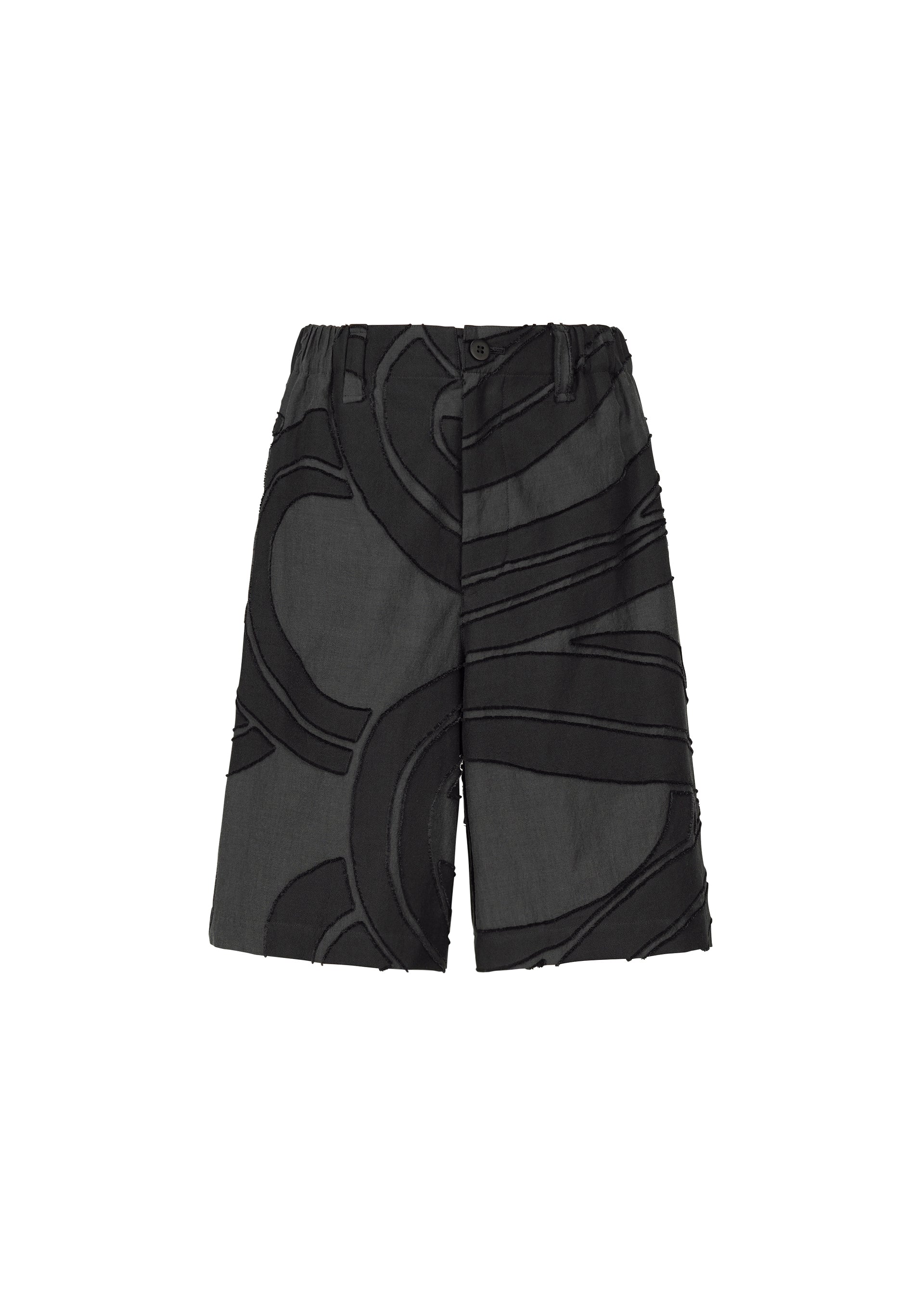 A product shot of the ISSEY MIYAKE MEN SCENES trousers in black (15).
