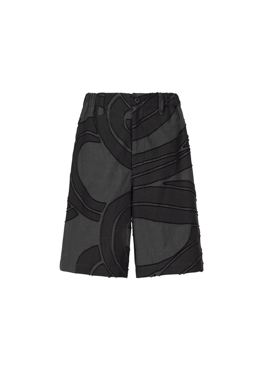 A product shot of the ISSEY MIYAKE MEN SCENES trousers in black (15).