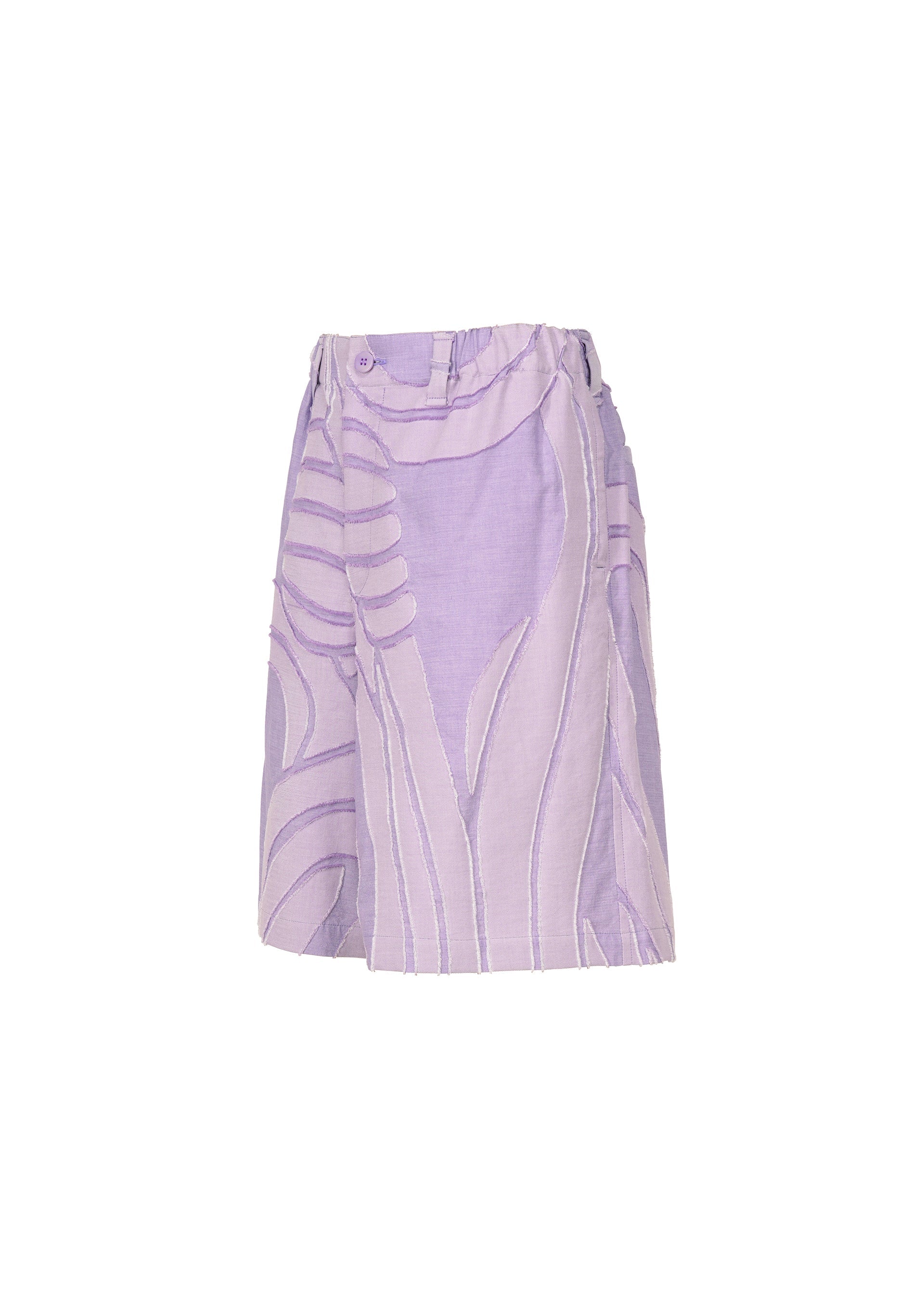 A detail shot of the ISSEY MIYAKE MEN SCENES trousers.