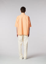 A model wears the IM MEN ONE CUT SHIRT shirt.