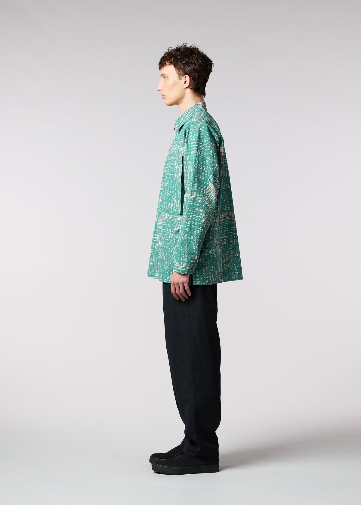 A model wears the IM MEN SKETCH SHIRT shirt.