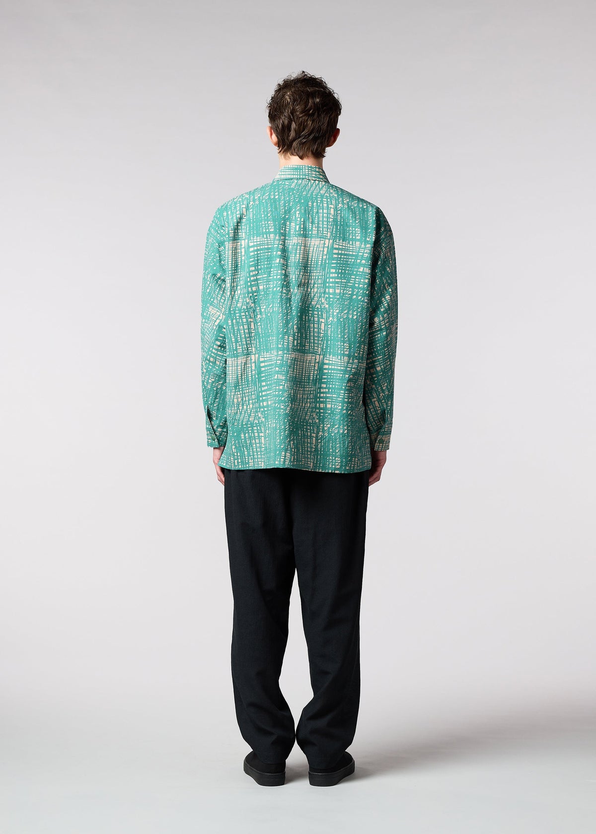 A model wears the IM MEN SKETCH SHIRT shirt.