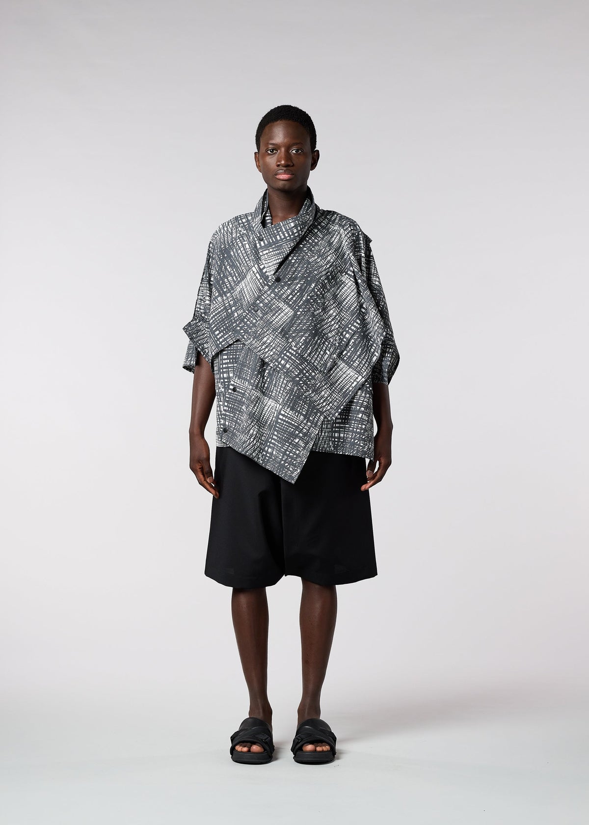 A model wears the IM MEN SKETCH SHIRT shirt.