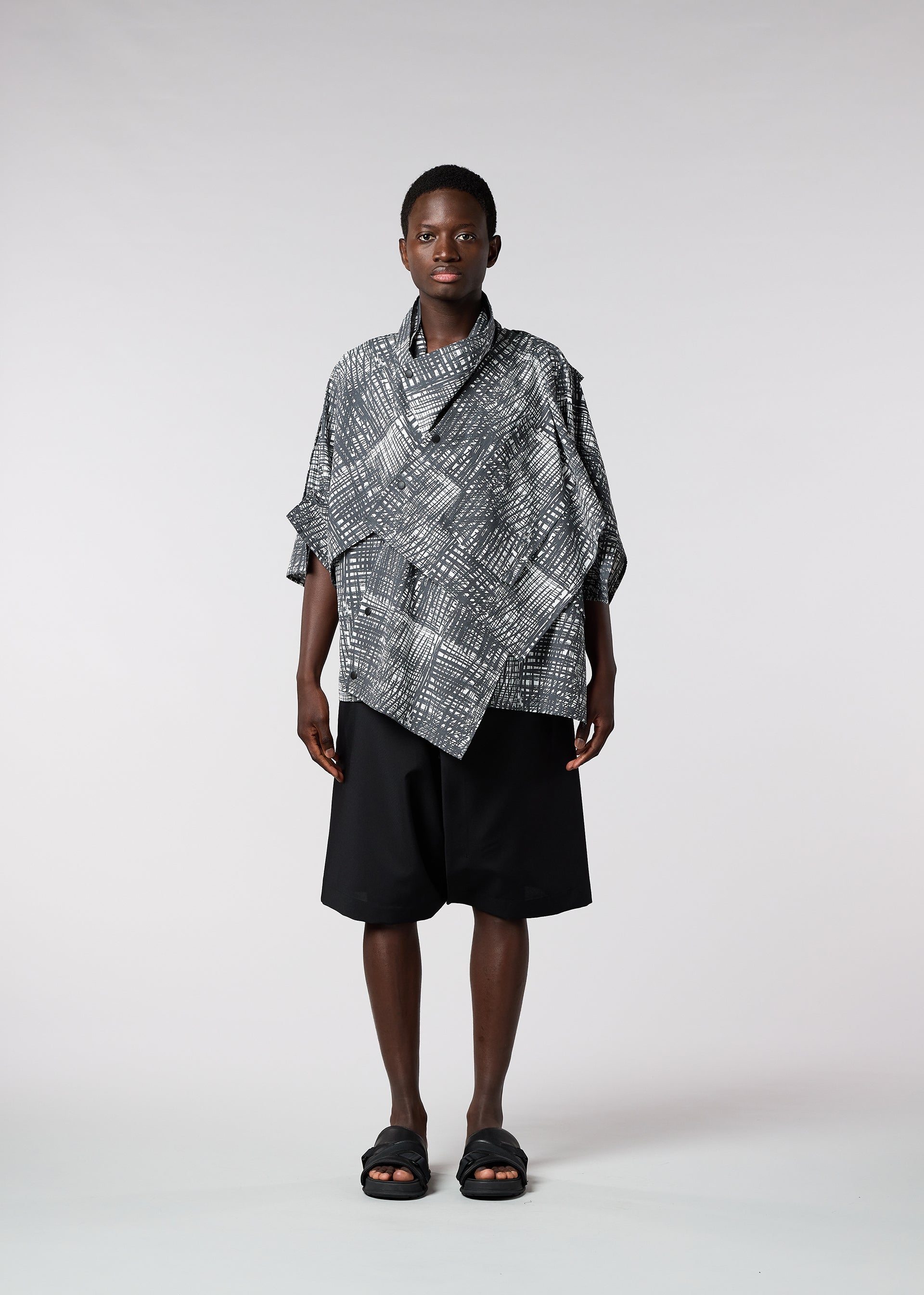 A model wears the IM MEN SKETCH SHIRT shirt.