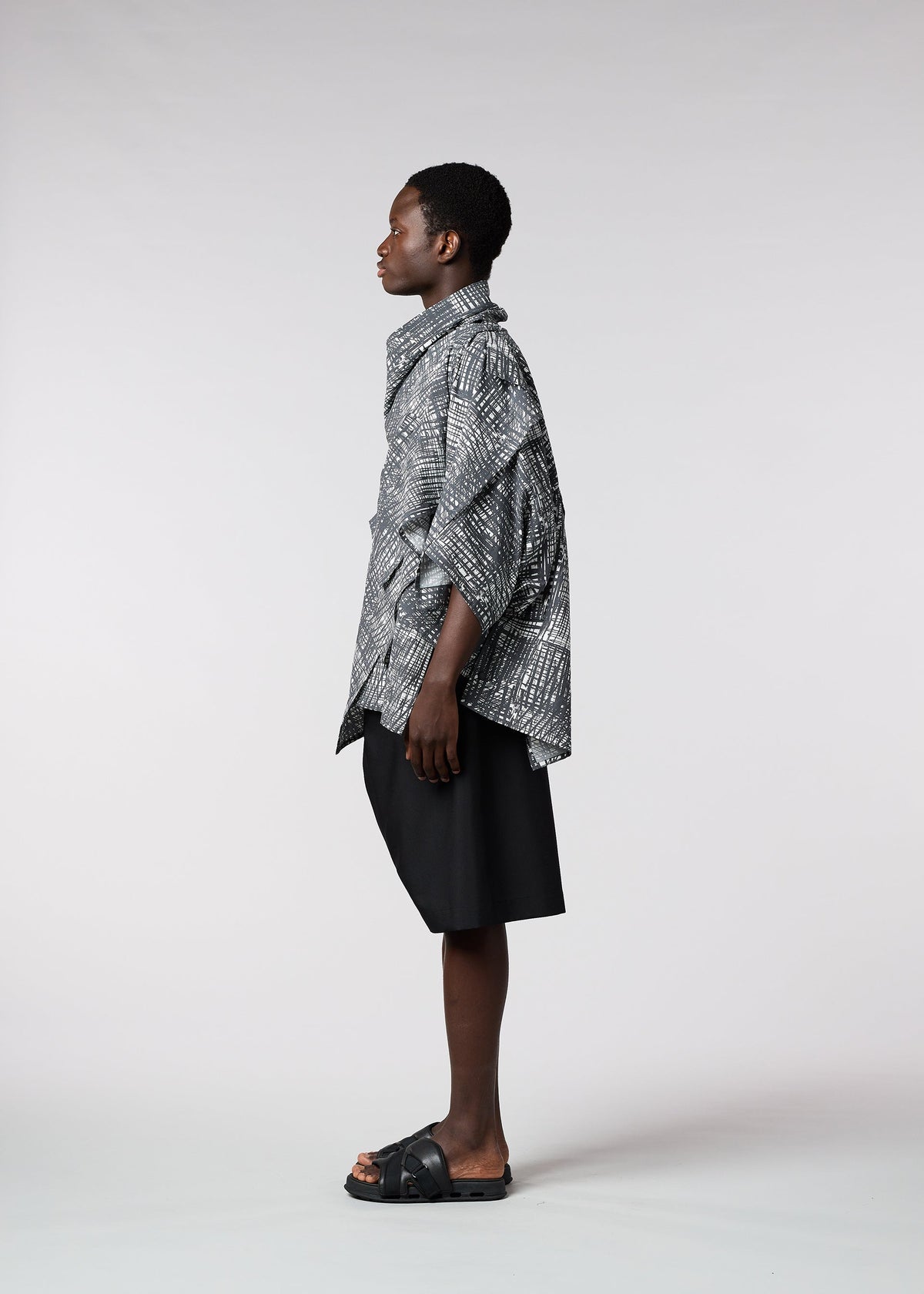 A model wears the IM MEN SKETCH SHIRT shirt.