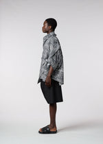 A model wears the IM MEN SKETCH SHIRT shirt.