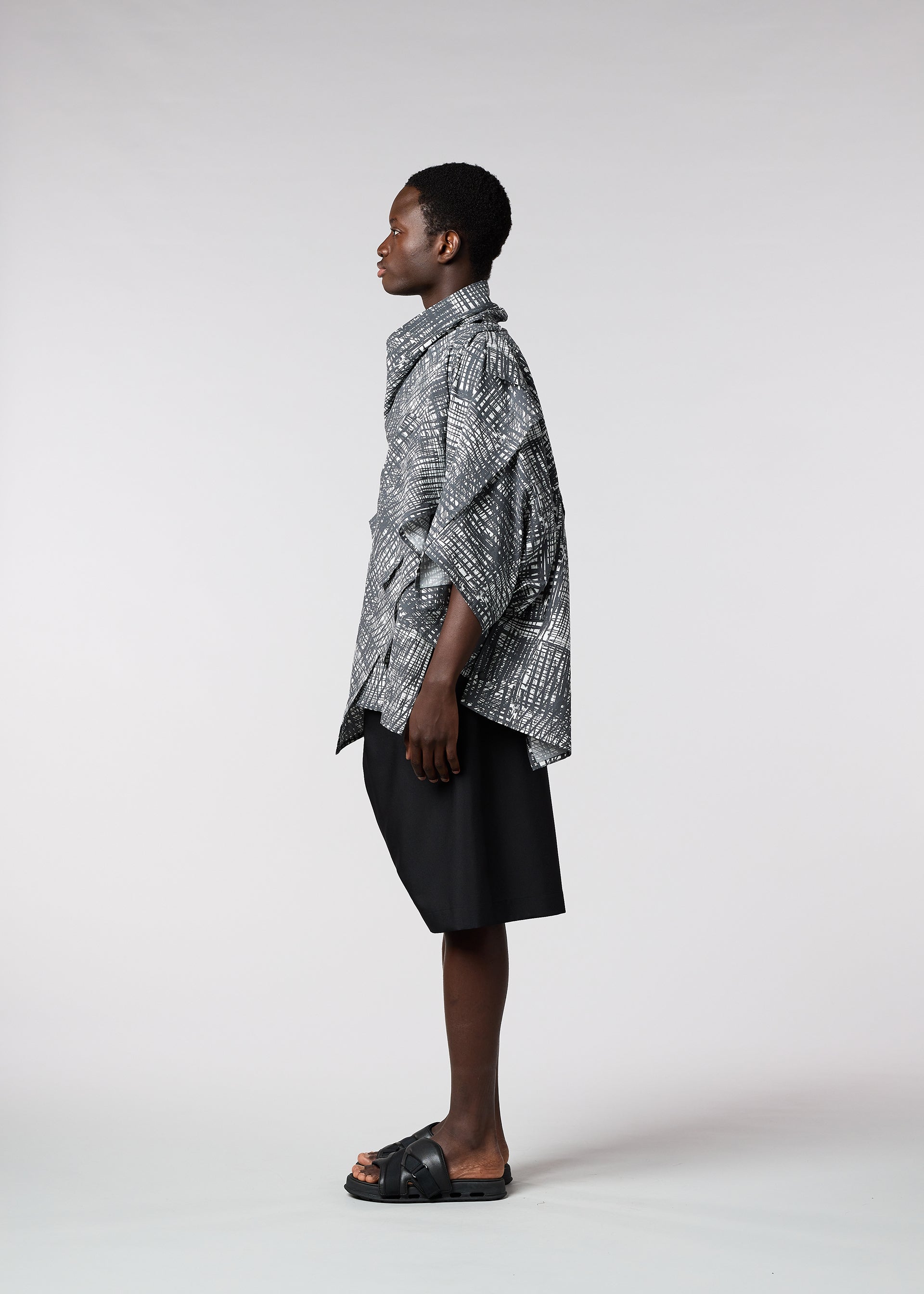 A model wears the IM MEN SKETCH SHIRT shirt.