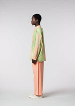 A model wears the ISSEY MIYAKE MEN BY CHANCE shirt.