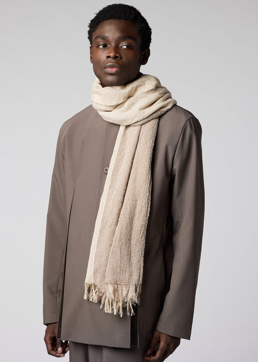 A model wears the IM MEN DOUBLE WEAVE STOLE stole.