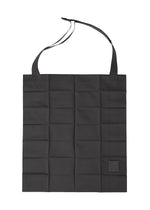 A product shot of the IM MEN PATA PATA bag in black.