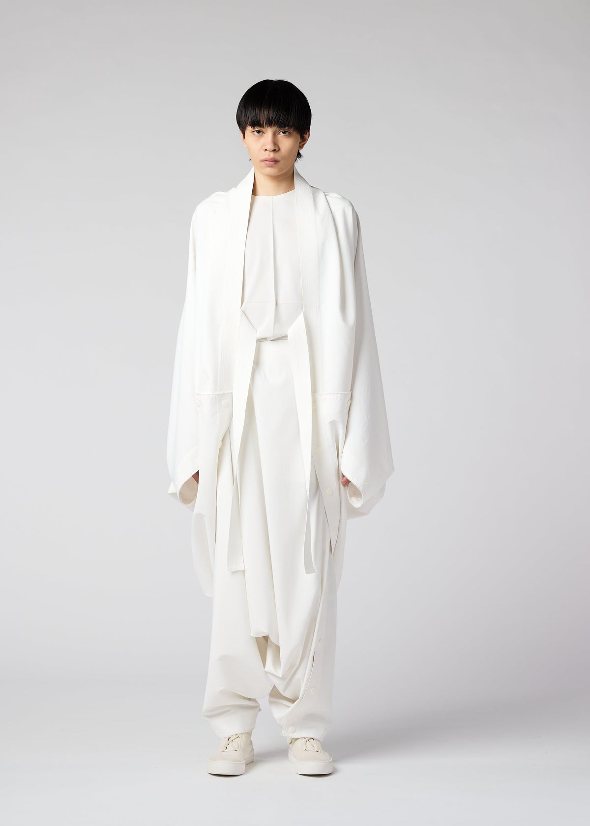 A model wears the IM MEN FLY coat.