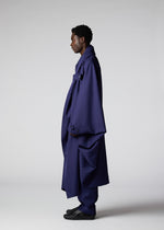 A model wears the IM MEN COCOON coat.
